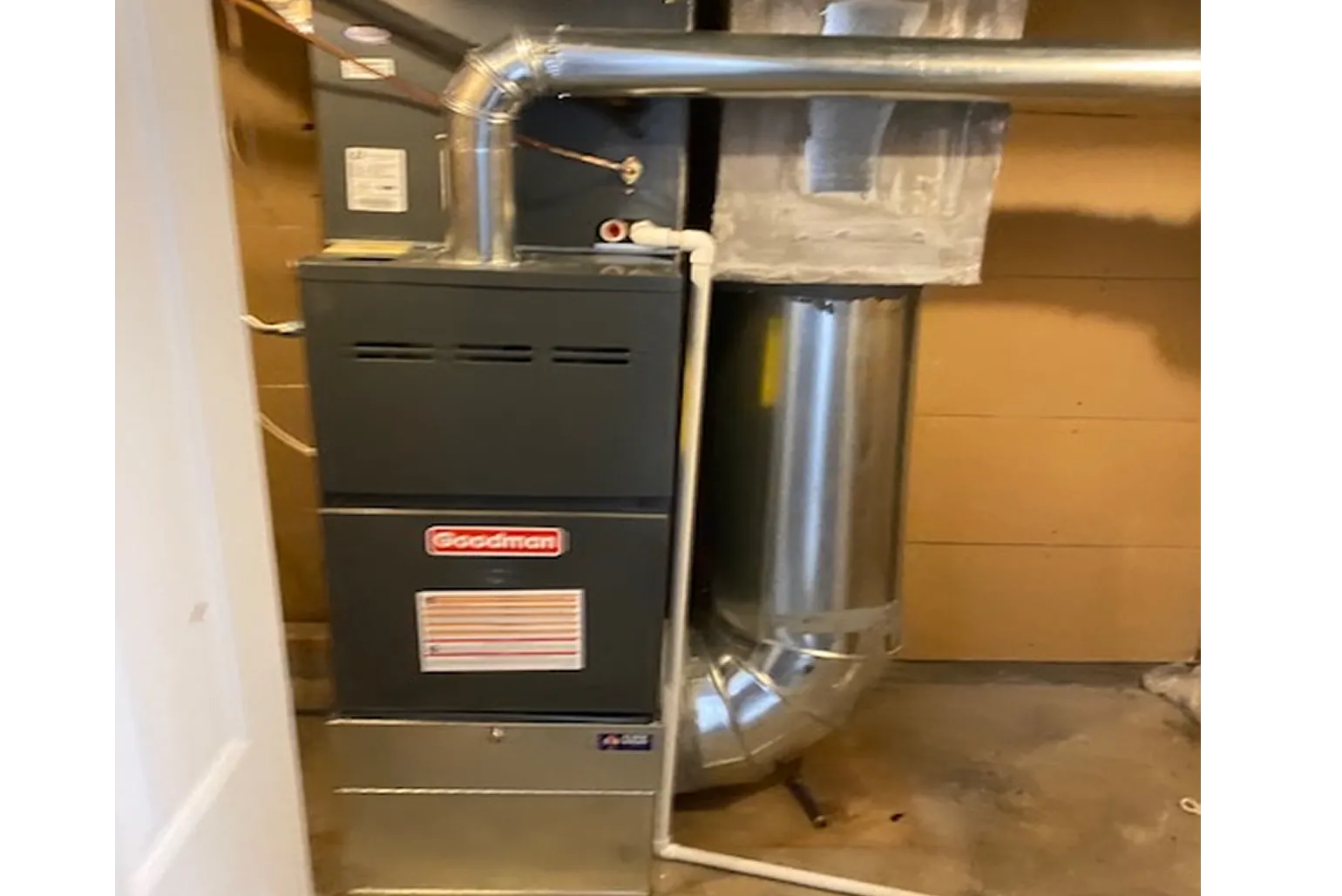 Home furnace unit with metal ductwork.